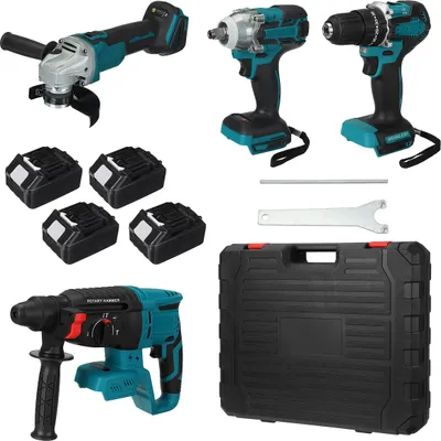 A collection of cordless power tools and accessories laid out on a white background.