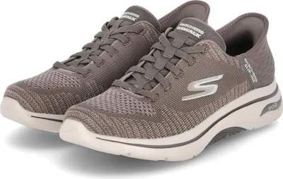 A pair of gray Skechers sneakers are shown from a slightly elevated side angle against a white background.