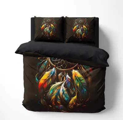 A bedding set with a dreamcatcher design is displayed on a bed.