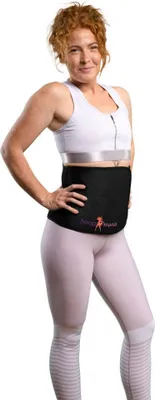 A woman is posing in athletic wear, wearing a black waist trainer.