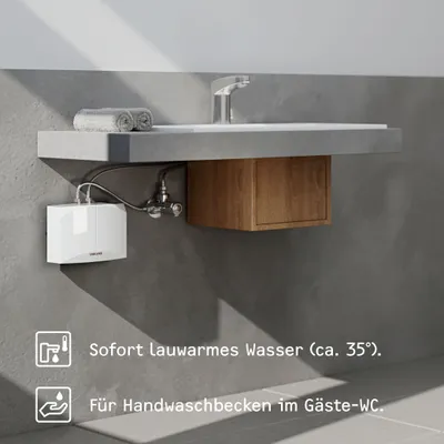 A white mini-water heater is installed under a sink in a bathroom, with text overlays describing its features.