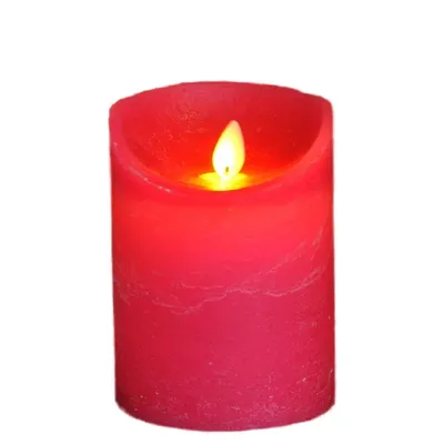 A red LED candle with a flickering flame.