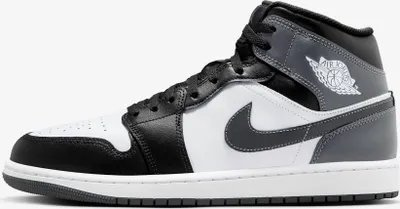 A side view of a single Nike Air Jordan 1 Mid shoe.