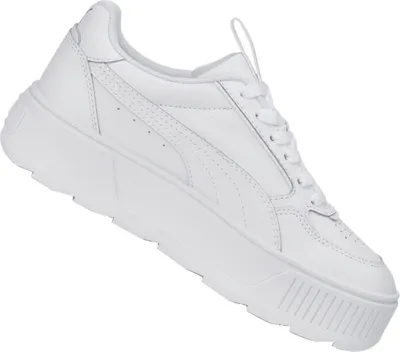 A white Puma sneaker with a platform sole is shown against a white background.