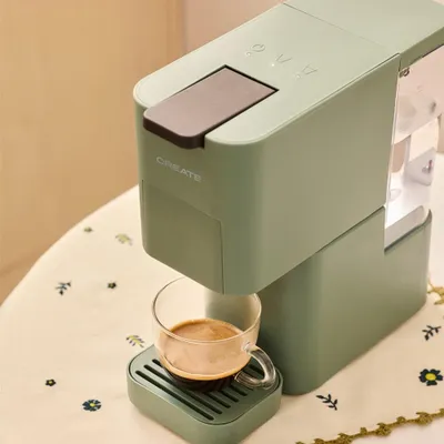 Produktbild von THERA STUDIO - Mehrkapsel-Express-Kaffeemaschine und gemahlener Kaffee