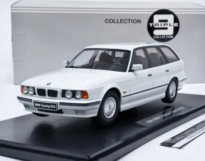Zdjęcie produktu dla BMW serii 5 Touring E34 (1996) biel alpejska Triple9 1:18