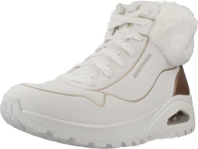 A white Skechers boot with fur trim is shown against a white background.