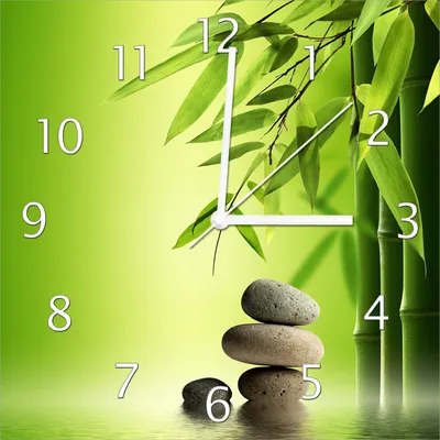 Produktbild von Wallario Design Wanduhr Steinstapel im Grünen aus Echtglas, Größe 30 x 30 cm