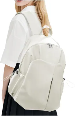 Produktbild von Unyqoos® Schulrucksack 27 L – wasserfestes Nylon für Teenagerinnen & Damen, 14 Zoll Laptopfach, Diebstahlschutzfach, Trolleyriemen, verstellbare Träger