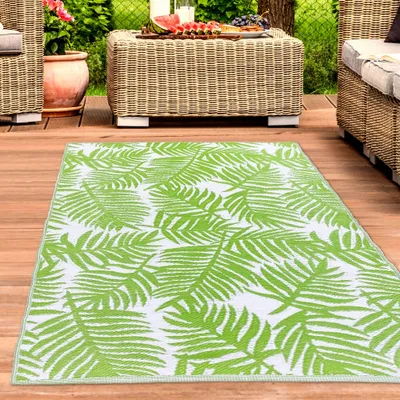 Produktbild von Outdoor-Teppich mit Palmenblätter Design in grün Größe - 180 x 280 cm