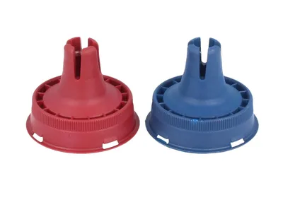 Two plastic caps, one red and one blue, are shown against a white background.