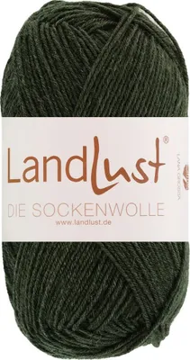 A ball of dark green yarn with a white label.