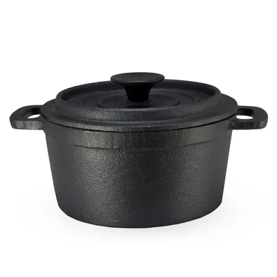 A black cast iron pot with a lid and handles, shown from a side angle against a white background.