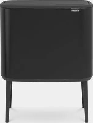 A black Brabantia Bo Touch Bin trash can with a lid, standing on four legs against a white background.