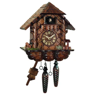 A wooden cuckoo clock with decorative carvings and pinecone weights.