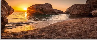 Produktbild von ARTland Glasbild Sonnenuntergang und Strand Größe: 125x50 cm