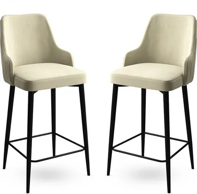 Two cream-colored bar stools with black legs are shown against a white background.
