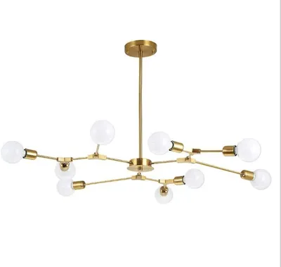A gold sputnik chandelier with multiple arms and exposed bulbs, presented against a plain white background.