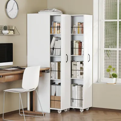 A white mobile bookshelf with books on shelves, next to a desk and chair in a room with a window.