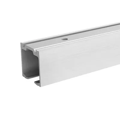 A close-up, studio shot of a silver aluminum sliding door track on a white background.