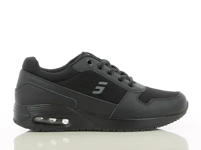 A black safety shoe is shown against a white background.