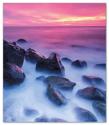 Produktbild von Wallario Herdabdeckplatte aus Glas, Größe 52 x 60 cm 1-teilig, Motiv Felsen im Meer bei Sonnenuntergang