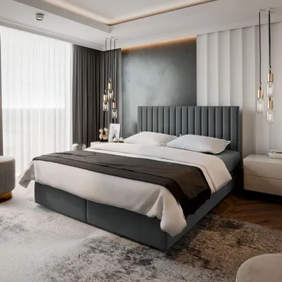 A modern bedroom with a large bed.