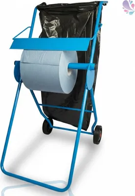 A blue metal stand with a large roll of light blue paper and a black trash bag attached.
