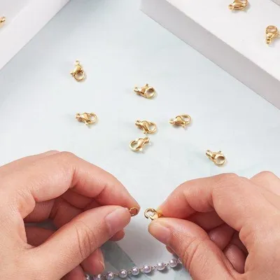 Produktbild von Krabbenklemverschlüsse, 100 Stück - Vergoldete Krabbenklemmen - Edelstahl 304 - Mini-Design - Leichtgewicht - Abmessungen: 10x6x3 mm - Karabinerhaken