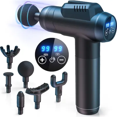A black massage gun with multiple attachments is displayed against a white background. A digital display on the gun shows '99 99'.