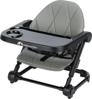 A close-up studio shot of a portable baby booster seat.
