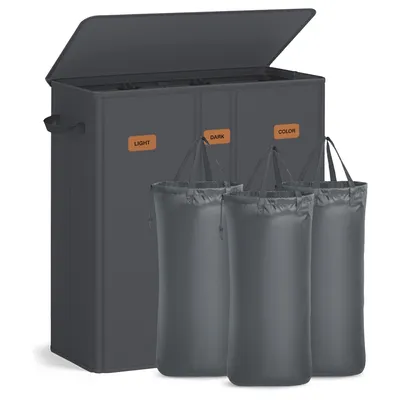 A dark gray laundry hamper with three compartments and three removable laundry bags.
