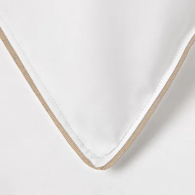 Produktbild von Traumschlaf Uni Kissenbezug White Collection Pipping 70x90 cm taupe