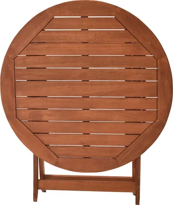 A top-down view of a round wooden folding table.