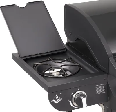 A close-up view of a gas grill's side burner and control panel.