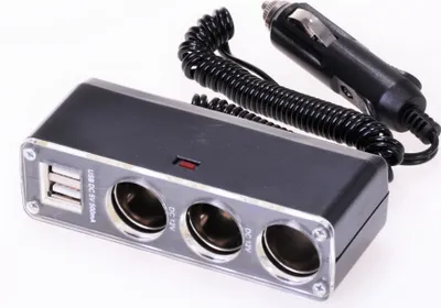 A car accessory that plugs into a cigarette lighter socket to provide multiple power outlets and USB ports.