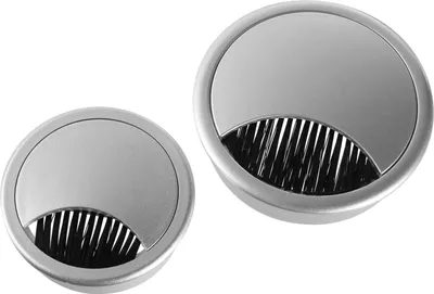 Two silver desk grommets with black bristles are shown against a white background.