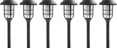 Six black solar-powered garden lights are arranged in a row against a white background.