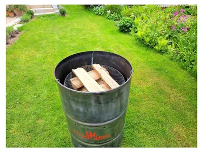 Produktbild von Grillplatte für Feuerkorb | Feuerbox | Feuerstelle | Trommel | ⌀48 cm | Inklusive Ketten und Haken | Für Feuertonne | Plancha | Feuerplatte | Hergestellt in Bayern