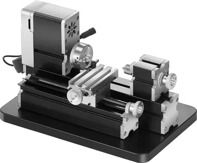 A mini metal lathe machine is shown against a white background.