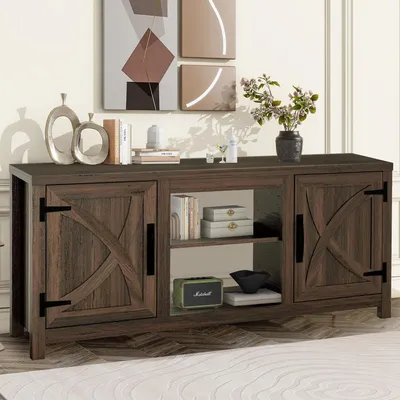 A dark brown TV stand with two doors and open shelves, decorated with items on top and inside.