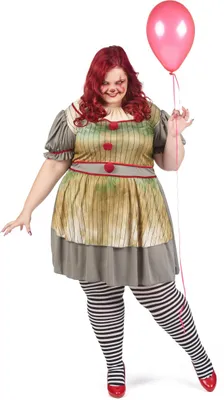 A woman in a clown costume holding a pink balloon.
