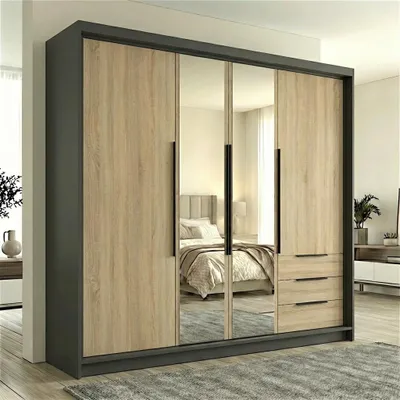 A modern wardrobe with mirrored doors and wooden accents, set in a bedroom.