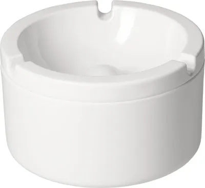 A white ceramic ashtray with indentations for cigarettes.