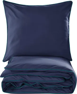 A folded duvet and a pillow, both dark blue with a teal trim, are displayed against a white background.