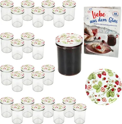 A collection of glass jars with strawberry-themed lids, a jar filled with dark jam, and a recipe book.