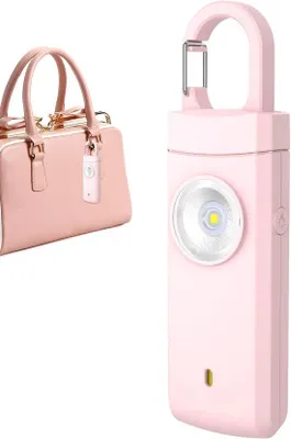 Produktbild von Persönliches Notfallalarm - 130 dB - Laut und starke Blitze - persönliche Sicherheitsalarm - Schlüsselanhänger - Taschenlampe - persönliche Schutz - Notrufsignal - Senioren Alarm - für Senioren, Frauen & Kinder - rosa