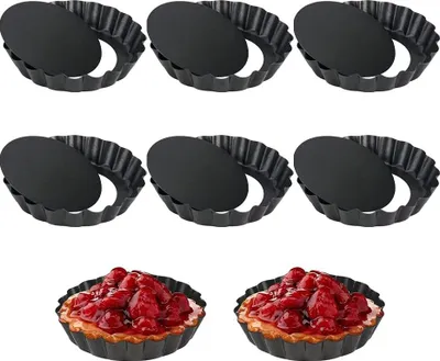 A top-down view of six tart molds, with the bottom row showing two finished mini tarts.