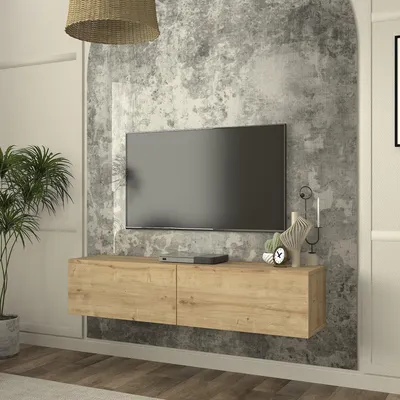 A modern living room with a wall-mounted TV unit.