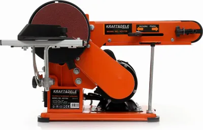 An orange and black oscillating belt sander is shown against a white background.